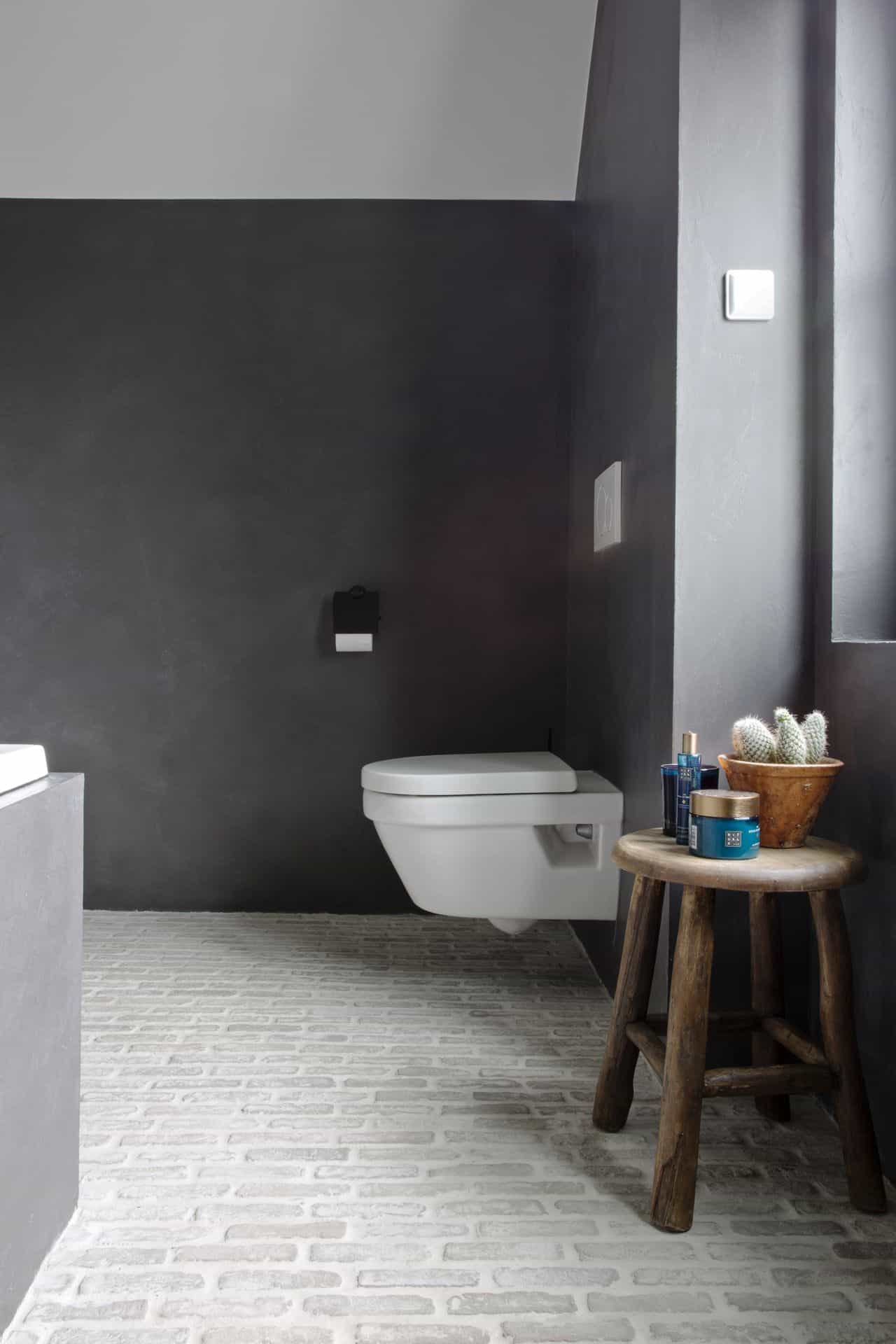 Dierentuin op gang brengen spellen Badkamer wanden betonlook: tot rust komen onder de douche of in bad
